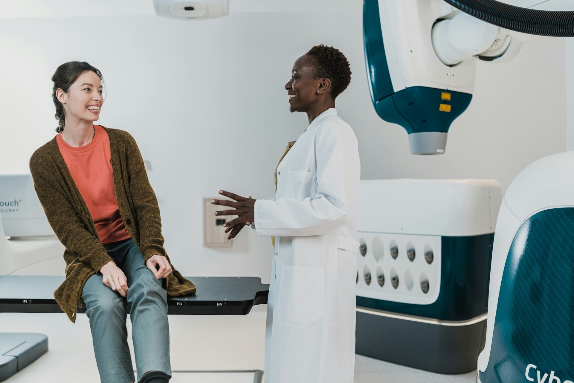 A doctor and patient in an operating room.