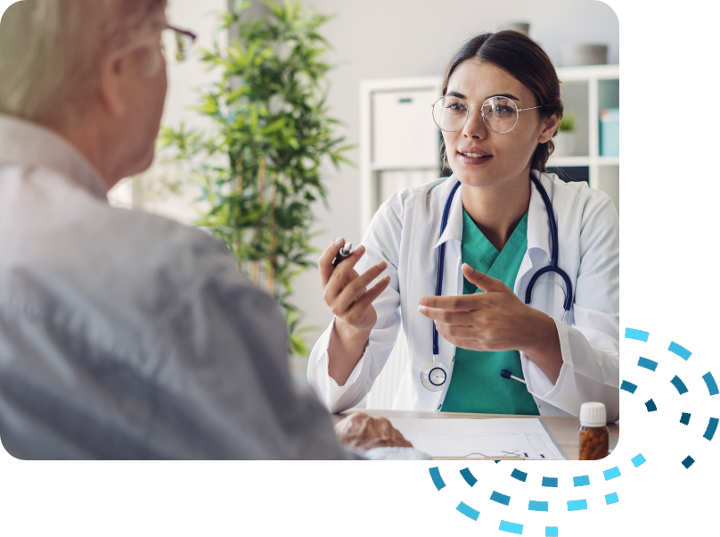 A doctor and patient talking to each other.